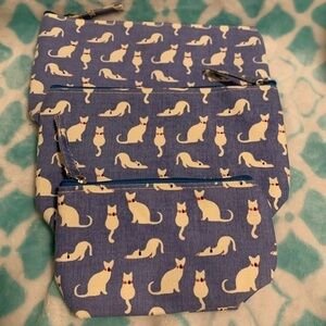 Rock flower paper set of three canvas zipped pouches cat print